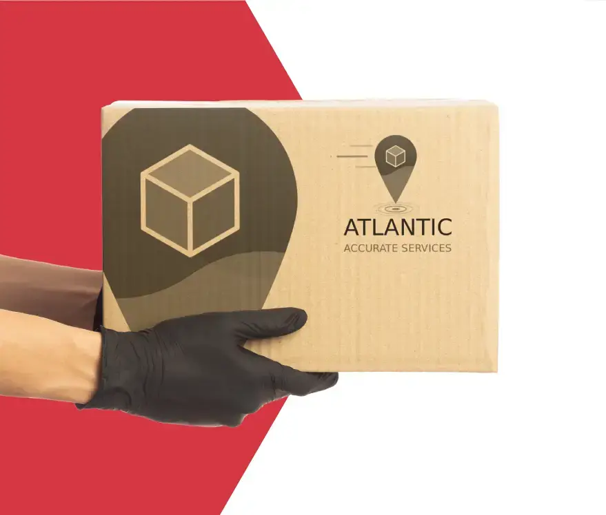Man holding a box with the company logo